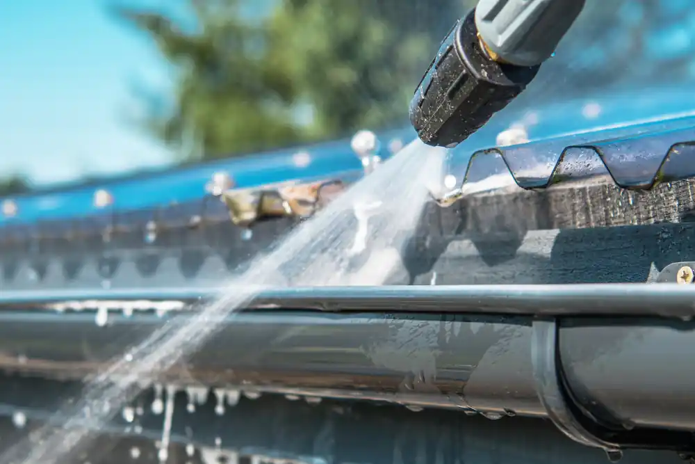 Closeup of a gutter cleaning flush